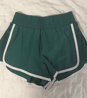 All In Motion Green and white target shorts with ruffle thumbnail 1