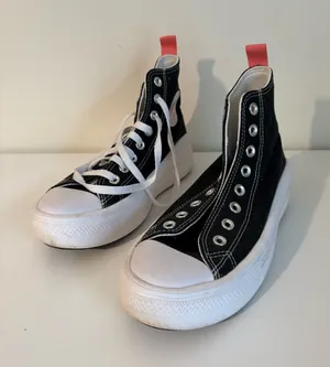 Converse Women’s Black High-Top Canvas Sneakers with White Sole thumbnail 1
