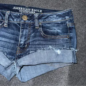 American Eagle Low Rise Micro Mini Distressed Jean Shorts Dark Denim Sz 6 y2k thumbnail 3