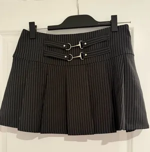 Princess Polly Black Pinstripe Pleated Mini Skirt with Double Buckles thumbnail 1
