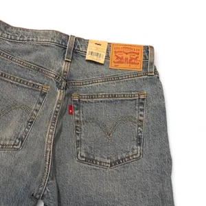 Levi’s 501 women’s mid thigh blue raw hem jean shorts thumbnail 3