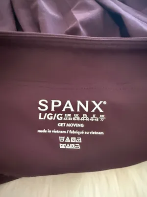 SPANX Pleated Athletic Skort in Plum Purple thumbnail 3