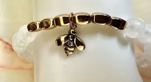 Avon white garden charm bee stretch bracelet thumbnail 1