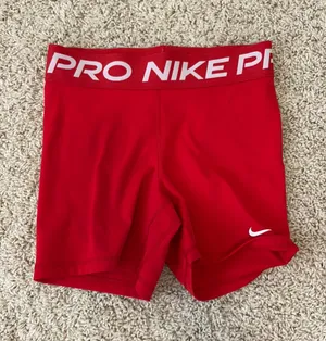 Red Nike Pro Spandex Shorts Women’s 3" thumbnail 1