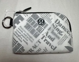 NWOT Lululemon Clippable Card Pouch in Manifesto Print Black and White thumbnail 1