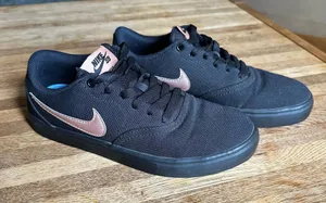 Nike SB Sneakers black with rose gold accents women’s size 7 thumbnail 1
