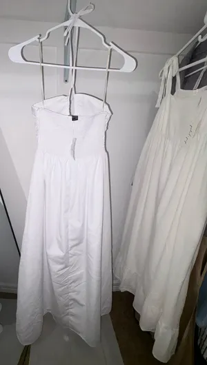 Forever 21 white halter/ tube maxi dress featuring a smocked back It is constructed with making it a staple piece for summer or vacation wear. thumbnail 6