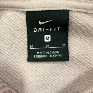 Nike Dri-FIT Just Do It Embossed Cropped Sweatshirt Mauve Lilac Medium thumbnail 8