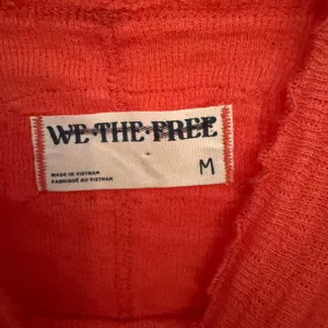 Free People We The Free Sarah Pointelle Turtleneck in red . NWOT, size medium . thumbnail 3