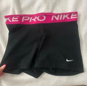 Black Nike Pros With Pink Band thumbnail 1