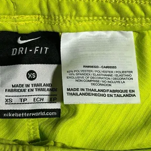 NIKE womens dri fit training running athletic shorts avocado green size xs thumbnail 3