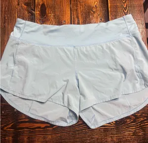 Blue teal lululemon shorts size 12 speed ups thumbnail 1
