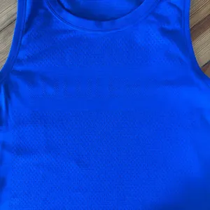 Lululemon Breeze By Muscle Crop Logo Tank in Jet Stream Blue Size 4 thumbnail 6