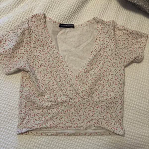 Brandy Melville Pink Floral Amara Top thumbnail 1