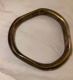 Abstract Shaped Metal Bangle Bracelet in Antique Gold Tone thumbnail 1