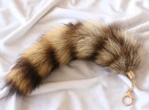 Brown and black striped raccoon tail keychain #raccoon #animal thumbnail 2