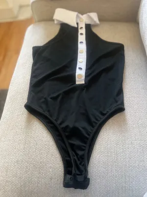 Seatyrocks Elevate your style with this chie black and white bodysuit. Perfect for any occasion, it features a sophisticated button- up design thumbnail 2