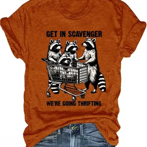 Get in Scavenger We’re Going Thrifting Orange Graphic Tee with Raccoon Design L thumbnail 1