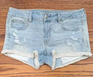 American Eagle Outfitters Distressed Blue shortie Jean Shorts. Waist 32 in thumbnail 1