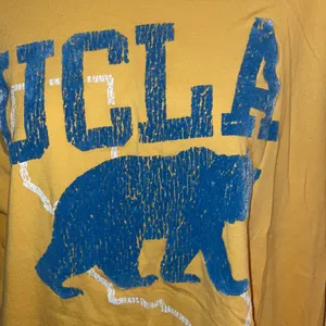 Distressed vintage UCLA college tee yellow and blue large 90’s thumbnail 3