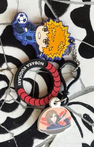 Jujutsu Kaisen Nobara Kugisaki Kura Sushi‎ & Blue Lock Rensuke Kunigami Keychain thumbnail 1