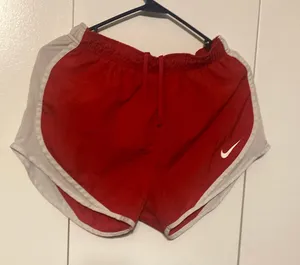 Nike Dri-Fit Women Size Medium Red/White Shorts thumbnail 1