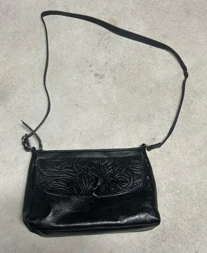 The Sak Ventura Small 100% Leather Crossbody Black Onyx Leaf Floral Printed thumbnail 1