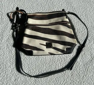 Dooney & Bourke brown and white zebra print crossbody bag thumbnail 1