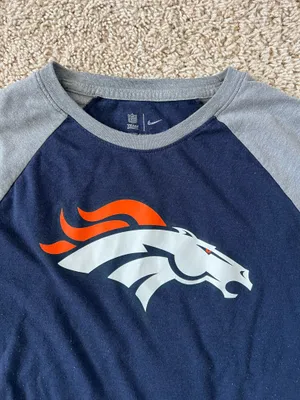 Denver Broncos logo on the chest. Navy body with gray raglan sleeves. Orange and white stripe accents on sleeves. Lightweight fan tee for game days. Nike. Size XL thumbnail 2