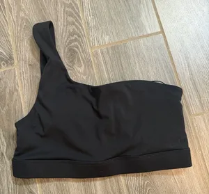 Fabletics Asymmetric One-Shoulder Black padded sports bra EUC size small thumbnail 1