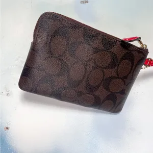 Coach wristlet with patent leather trim thumbnail 4