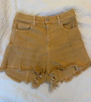 REVICE High-Rise Frayed Hem Jean Shorts in Mustard thumbnail 1