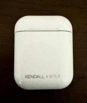 Kendall + Kylie white earbuds with case  thumbnail 1
