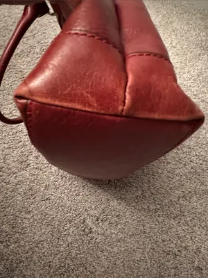 Wilson’s EUC burgundy red genuine leather purse. Satchel with crossbody option thumbnail 9