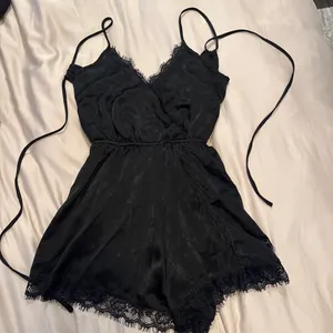 Black lace romper with lace trim thumbnail 1