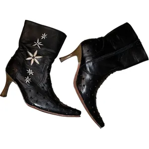 El Canelo lady’s black booties with cream flowers on side. thumbnail 3