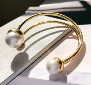 Gold Asymmetry Layered Pearl Bangle and Ring Set thumbnail 1