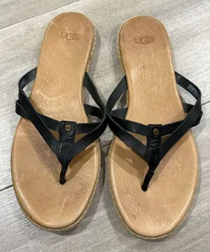 UGG Women's Black Leather Thong Sandals with Tan Footbed Size 7 thumbnail 1