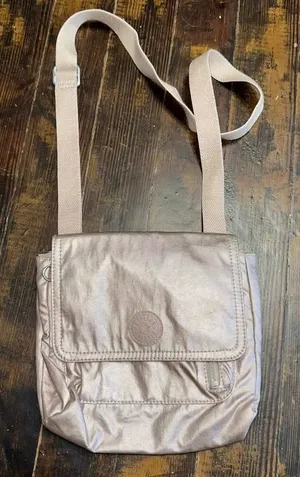 Kipling shimmery pink travel crossbody small purse thumbnail 1