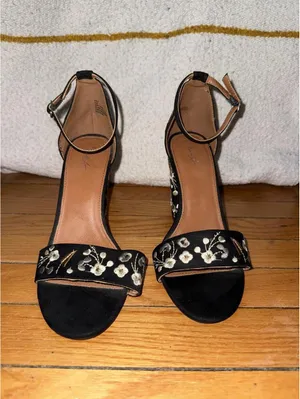 Mari A black floral heels feature a high block heel thumbnail 2