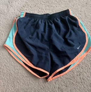 Nike Women's Navy Athletic Shorts with Aqua Panels and Coral Trim thumbnail 1