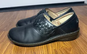 UGG Anila black leather slip-on clogs with a woven vamp detail size 9 thumbnail 1