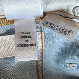 NWT Madewell 90’s Straight Jean 33 needs to be washed liquid spilled on front thumbnail 11
