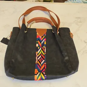 Elegant Black Tote Bag with Brown Handles and Colorful Pattern thumbnail 1