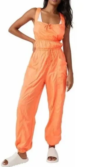 Free People Movement tropic sport one piece orange jumpsuit. Size medium thumbnail 1