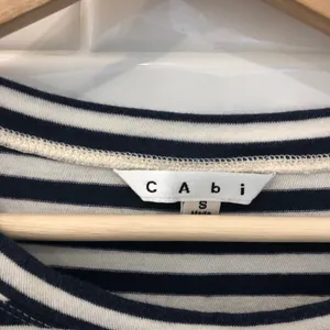 CABI bengal stripe asymmetrical hem top thumbnail 8