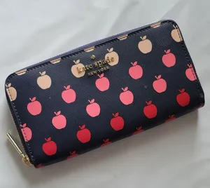 Kate Spade Staci large continental wallet with an apple print thumbnail 1