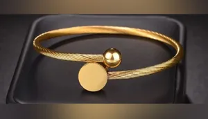 Elegant Gold-Tone Bangle Bracelet stainless steel NWOT One size fits all thumbnail 1