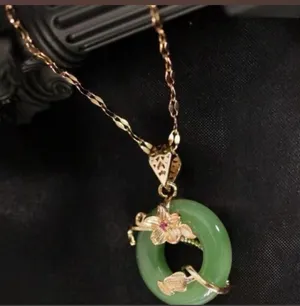 Brand New Green jade pendant with gold floral design and a small red gemstone 18 K gold plated thumbnail 3