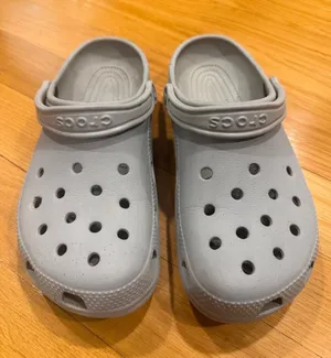 Crocs  unisex gray clogs size men 9 women’s 11. thumbnail 1